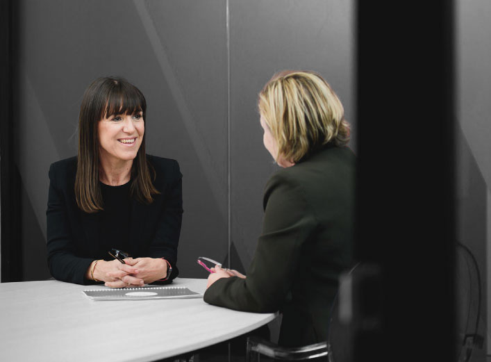 Financial Adviser talking with the client about their financial objectives